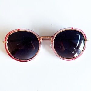 round sunnies with clear pink frames
